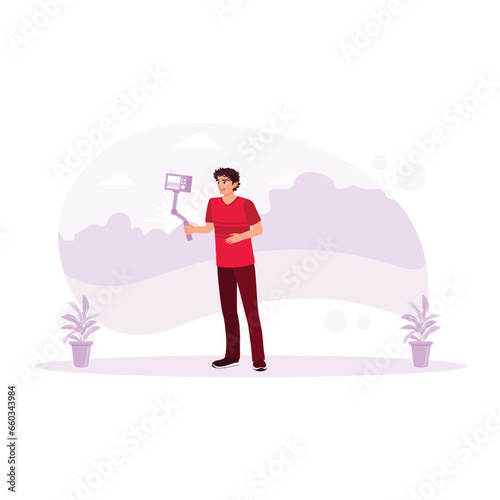 Young male content creator making video at sunrise. Social media influencers or content creators. Content Creator concept. Trend Modern vector flat illustration