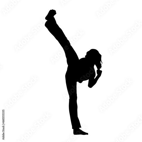 Silhouette of a woman kicking pose. Silhouette of a female martial art in action pose.