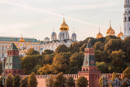 MOSCOW, RUSSIA - SEPTEMBER 26, 2023: View of Moscow on an autumn evening at sunset. Kremlin towers. The Grand Kremlin Palace, the Assumption and Annunciation Cathedrals. A popular tourist attraction.