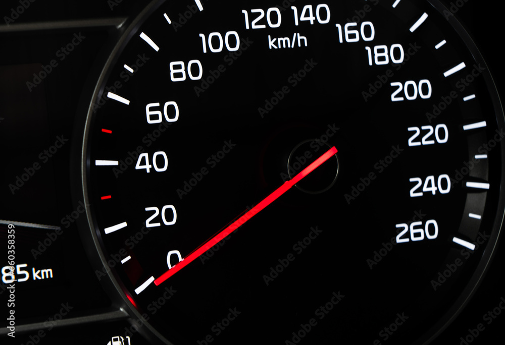 Close up shot of speedometer in car. Car dashboard. Dashboard details with indication lamps.Car instrument panel. Dashboard with speedometer. Car inside