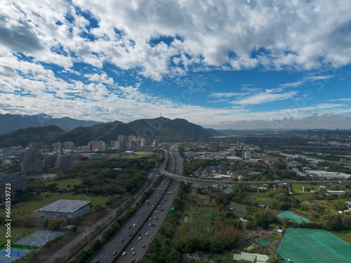 Aerial view of Sanxia District with cars on highway in New Taipei City, Taiwan. National Taipei University (NTPU) located here.