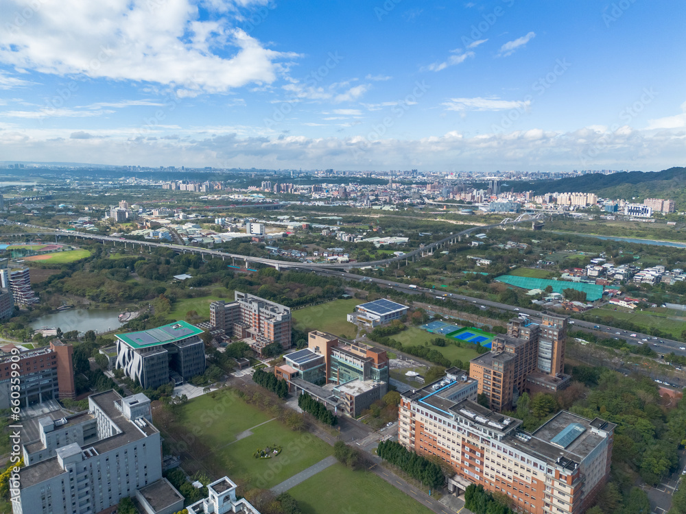 National Taipei University Aerial View at Sanxia, New Taipei City, Taiwan. Beautiful campus with sunset and green grass.