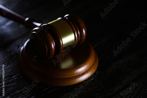 Judges gavel on wooden desk. Law firm concept.