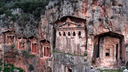 Aerial drone view of Lycian tombs of kings in ancient city of Kaunos in Dalyan valley in Turkey photo