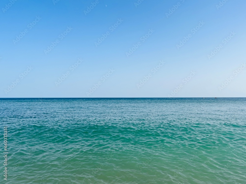 Blue sea horizon, clear blue sky and seascape background