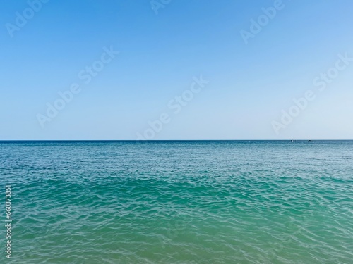 Blue sea horizon, clear blue sky and seascape background