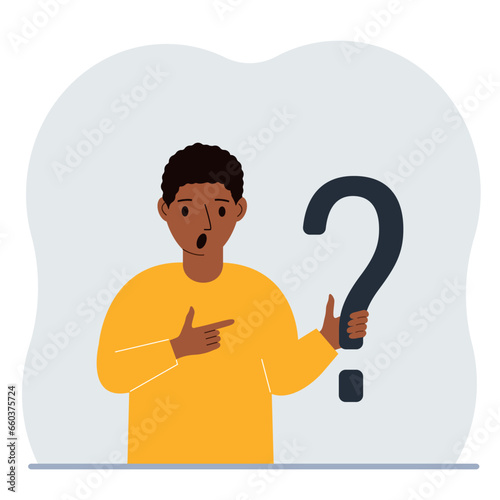 A man is holding a question mark symbol. Ask questions and look for answers. FAQ or frequently asked questions concept, online support center.