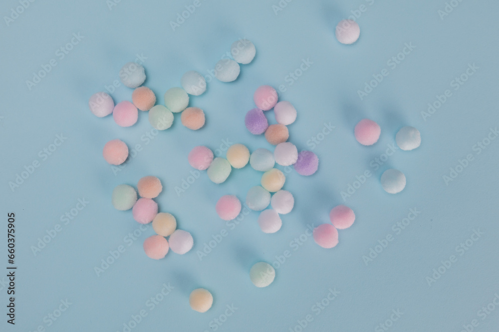 colorful pastel balls on a blue background