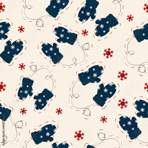Vector seamless Christmas pattern with mittens on a string and snowflakes.
