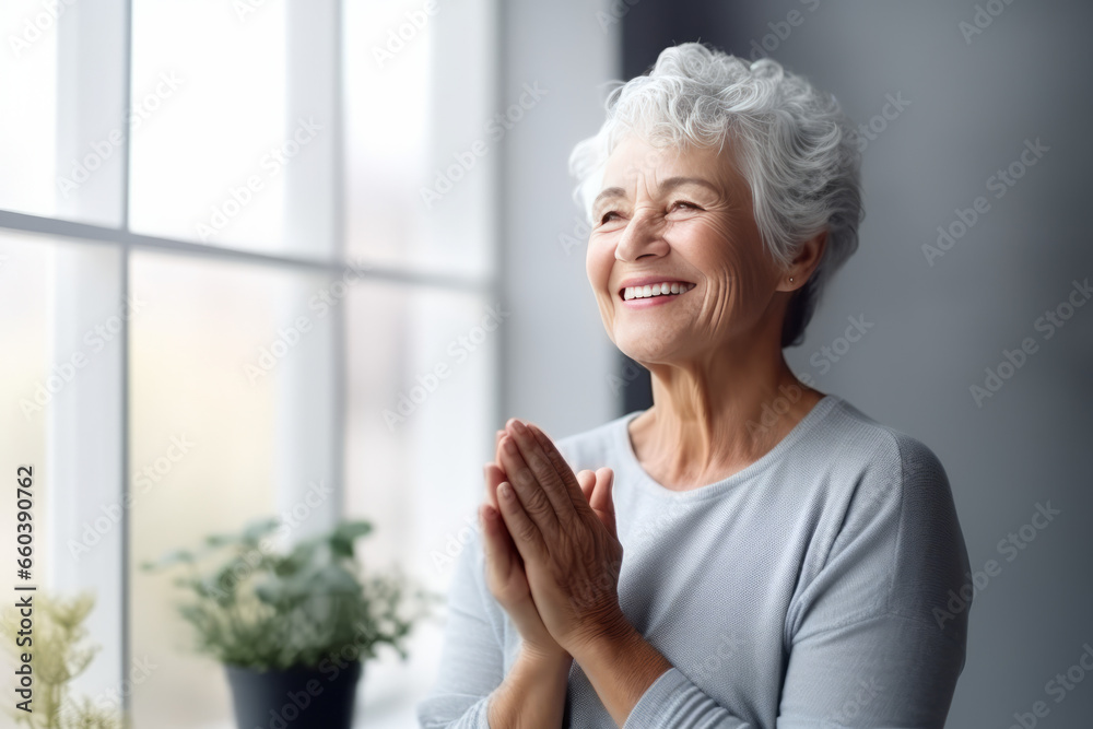 Senior woman holding hands before breakfast Senior woman holding hands before breakfast