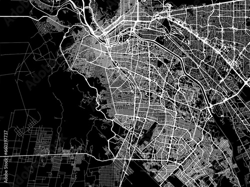 Vector road map of the city of  Ciudad Juarez in Mexico with white roads on a black background.