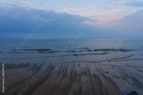 Calm seas on a late summer evening on Llanbedrog beach. photo