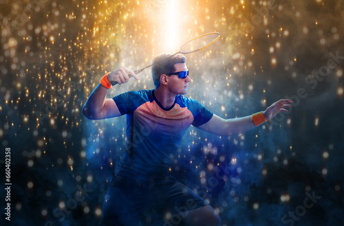 Badminton player. Man with racket and shuttlecock on golden background. Individual sports. Sports recreation.