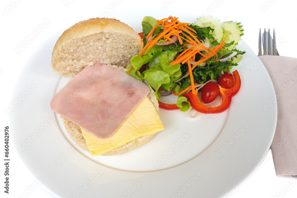 Soft brown roll with ham and cheese on white background isolated.