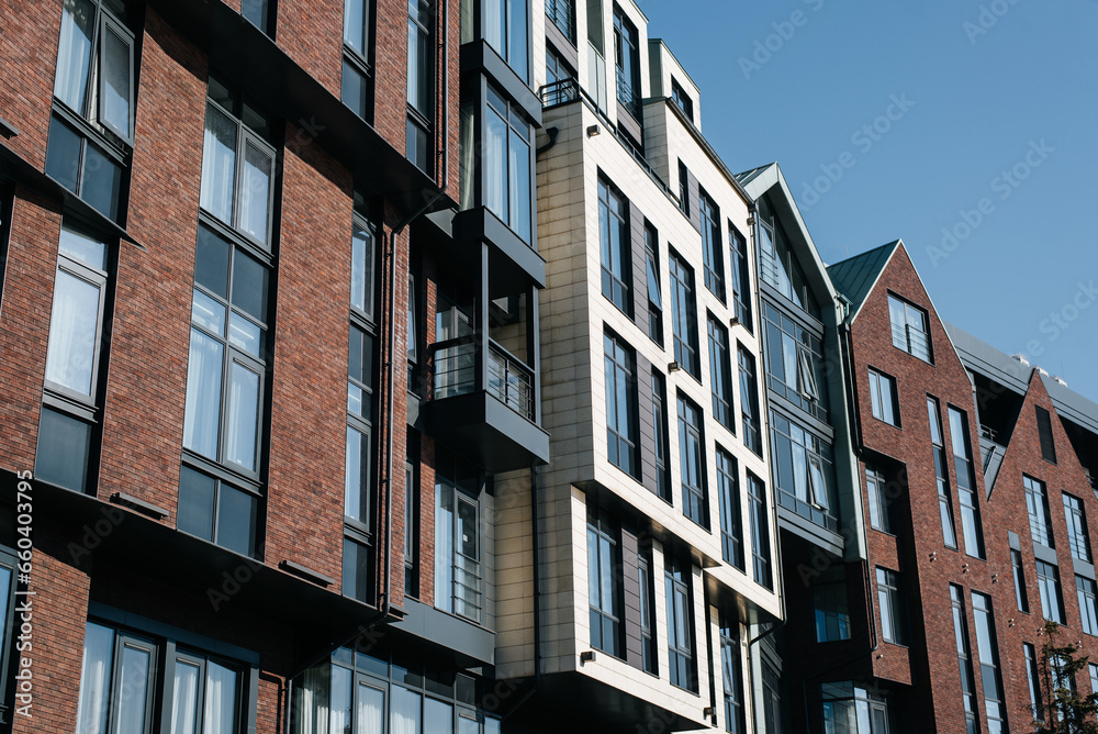 Modern apartment building in Scandinavian style, exterior on a sunny day