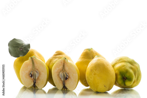 Ripe natural autumn quince on a white background. photo