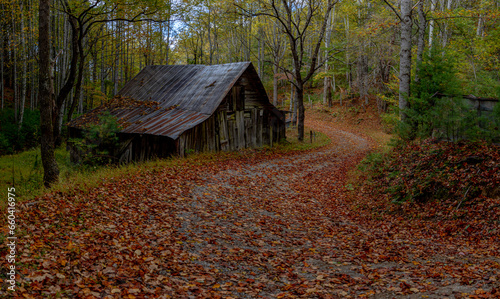 Old barn on a curvy road