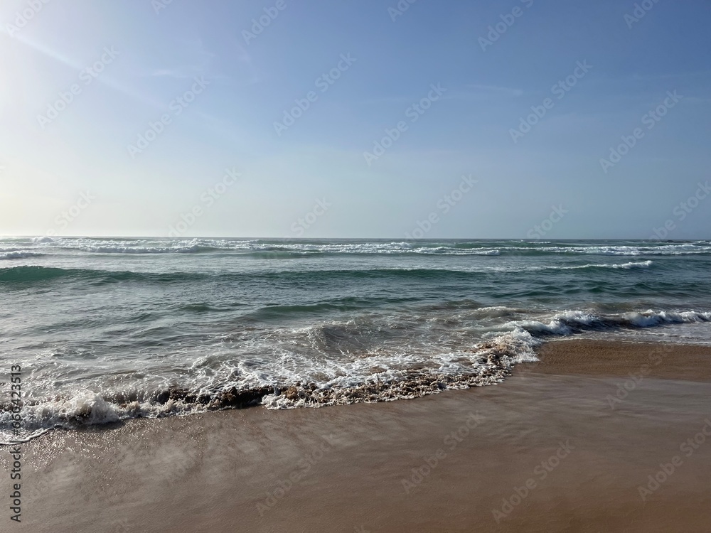 Fototapeta premium Waved ocean bay, sandy coast