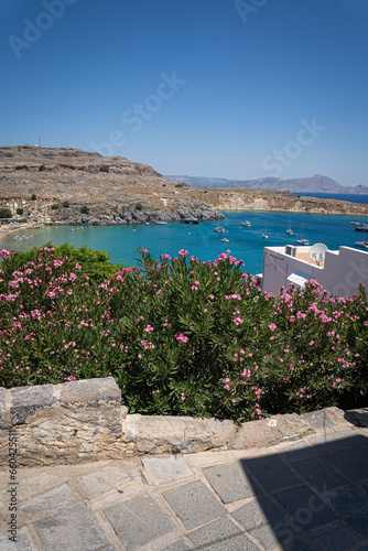 Charming Narrow Streets of Lindos: A labyrinth of whitewashed buildings and cobblestones, revealing the heart and soul of Rhodes Island's historic gem.