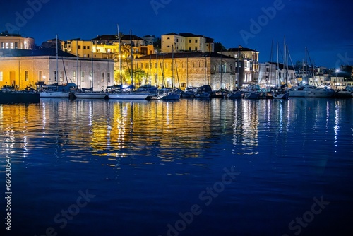 Night shot of Chania's Venetian harbor on the island of Crete. © Wirestock