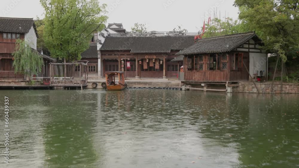 Historical buildings in Wuzhen Water Town on a rainy day in the north of Zhejiang Province, China