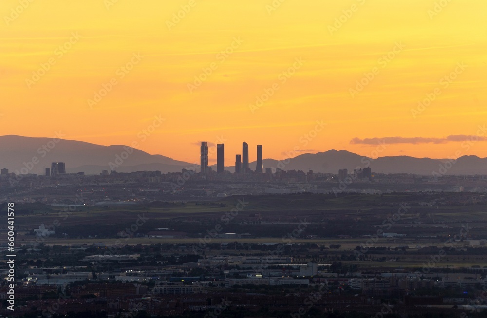 Fototapeta premium Scenic view of an orange sunset over the valley of Henares in Madrid, Spain