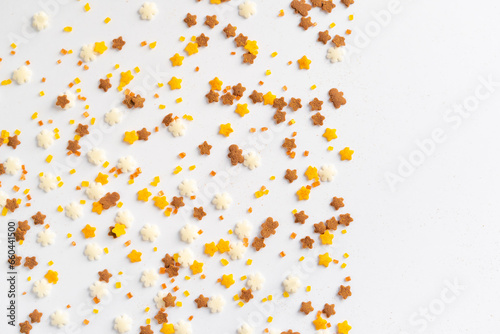 sugar crystals seamless texture. Sweet sprinkles on white background. Sweet backing decoration for cake and candy. Copy space. 