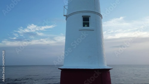 Wallpaper Mural Drone footage of the Berwick Lighthouse at sunset in Berwick-upon-Tweed town, England Torontodigital.ca