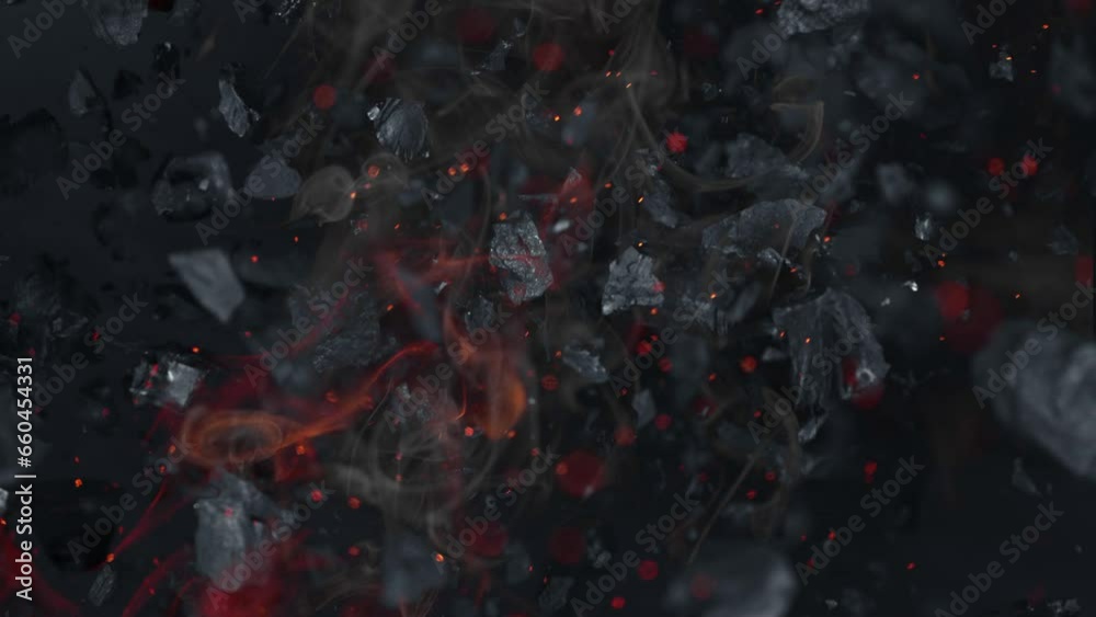 Super Slow Motion Shot of Coal, Flames and Sparks Explosion Towards Camera at 1000 fps. Super Slow Motion Shot of Coal, Flames and Sparks Explosion Towards Camera at 1000 fps.