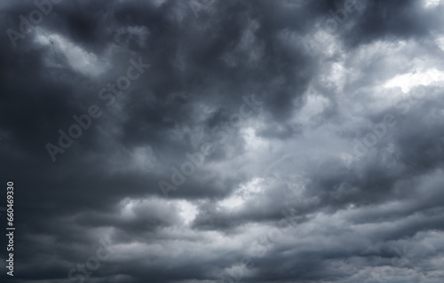 dark clouds make sky in black. Heavy rain thunderstorm. Pattern of clouds overcast predict tornado, Hurricane or thunderstorm and rainy. Dark sky cloudy have storm and lightning thunderbolt.