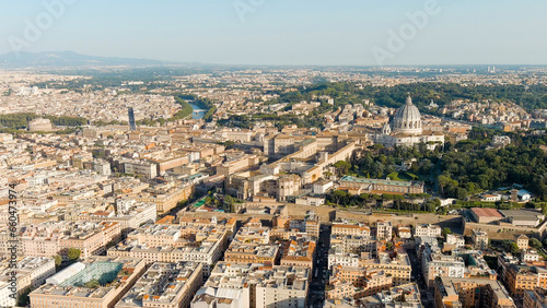 Rome, Italy. View of the Vatican. Basilica di San Pietro, Piazza San Pietro. Flight over the city. Evening time, Aerial View