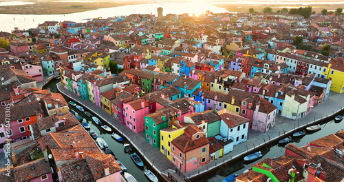 Aerial view of the colorful houses of the Burano Island, in the Venice province, Veneto region, Italy, sunrise golden hour