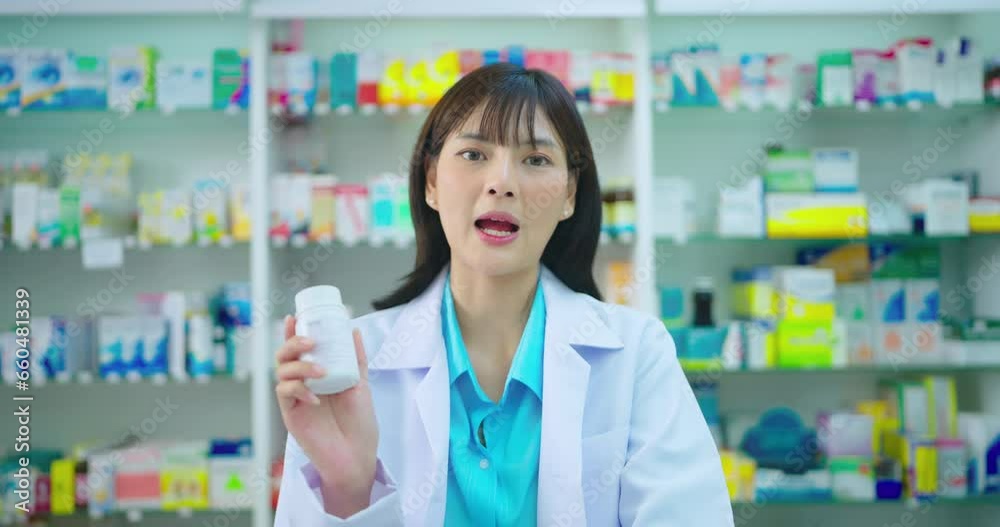 Female pharmacist talking with customer in drugstore. She explaining detail about drug in pharmacy. Female pharmacist talking with customer in drugstore. She explaining detail about drug in pharmacy.