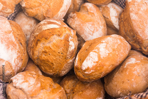 Ruddy rolls of fresh warm grain bread