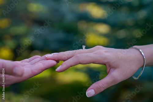 Close-Up Of Couple Holding Hands