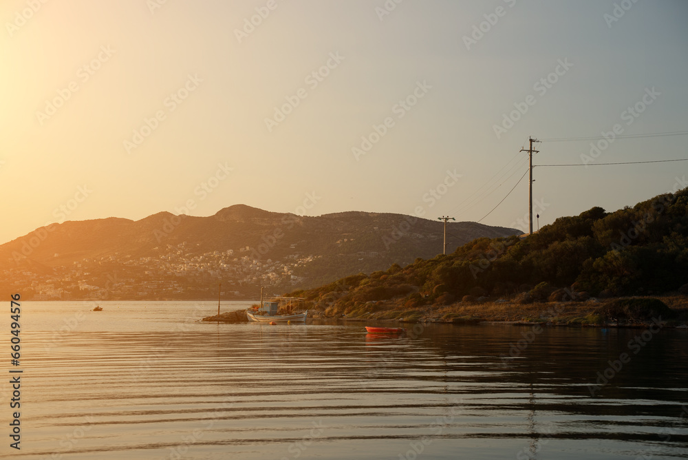 View of seabay with island in Porto Rafti in Greece.