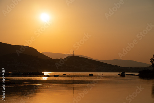 Sunset in Porto Rafti seabay in Greece. photo