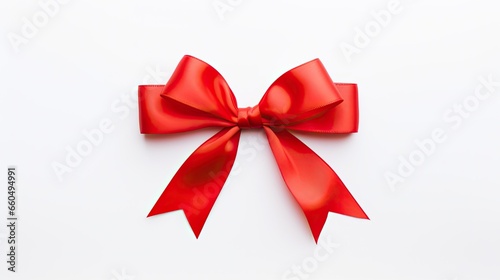 Red ribbon bow with white background.