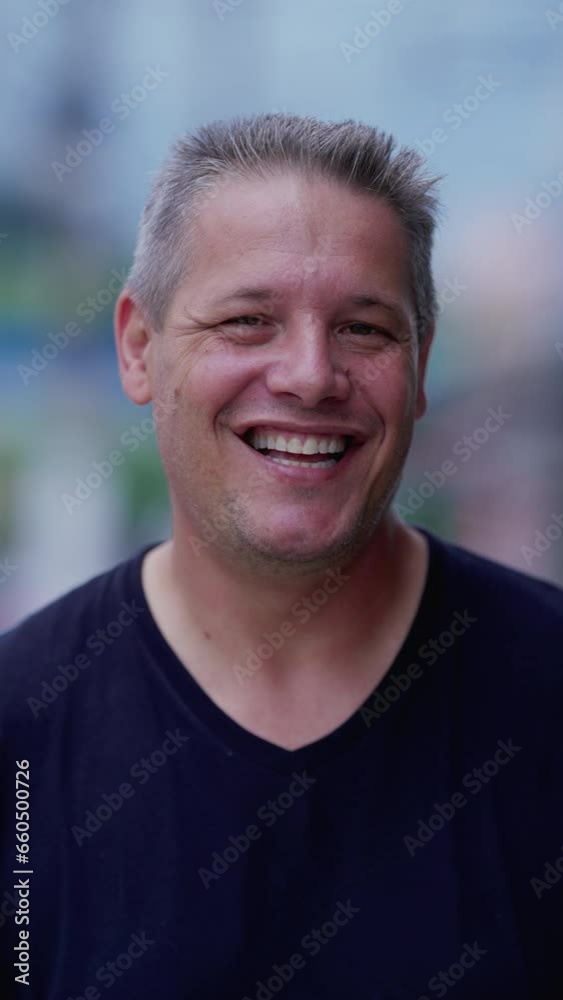 Happy Middle-Aged Man Smiling and Laughing at Camera in Vertical Video Happy Middle-Aged Man Smiling and Laughing at Camera in Vertical Video