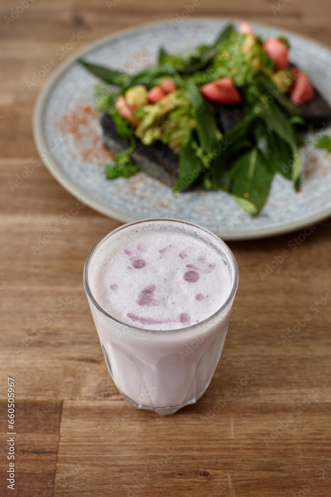 Healthy organic vegan food and drinks on wooden table Healthy organic vegan food and drinks on wooden table