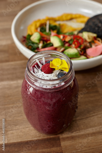 Healthy organic purple berry smoothie drink photo