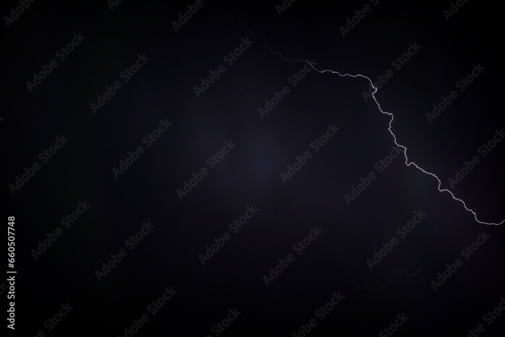 Beautiful Lightning Strikes and Clouds at Night in Lugano, Ticino, Switzerland.