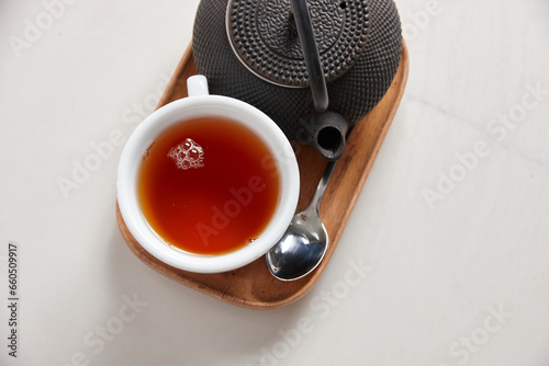 Fresh cup of tea served on table photo
