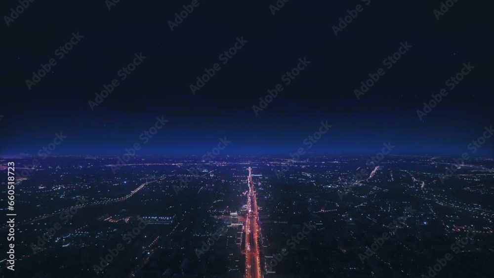 AERIAL. Epic sunset, fast time changing from evening to night. Top view of city huge city at night time
