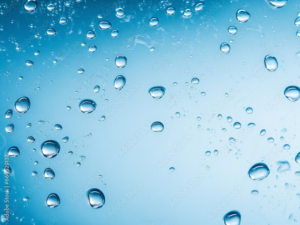 Extreme close-up of water droplets with ample space for text in a blue background.