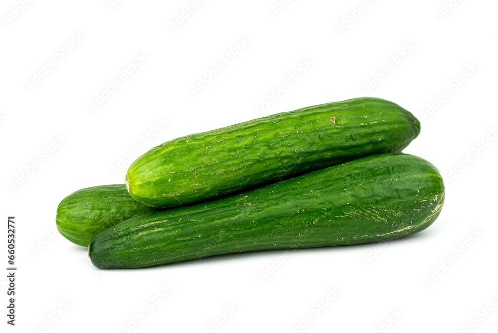 the fresh green cucumbers isolated on the white background the fresh green cucumbers isolated on the white background