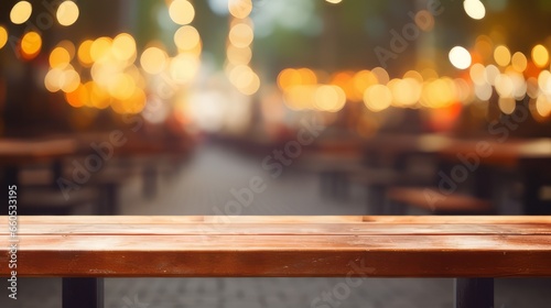 Empty wooden table and abstract bokeh light of blurred