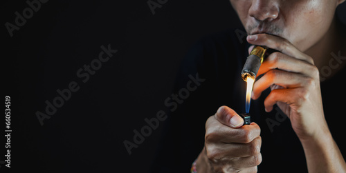 A man smoking a cigar.