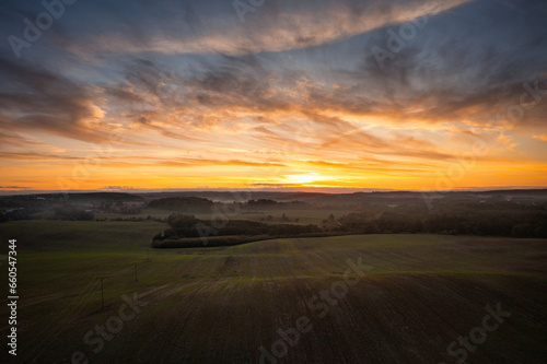 Autumnal landscape of Kashubian forests at sunset. Poland