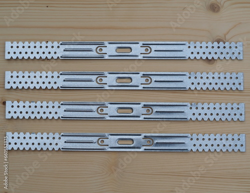 Partitioning or drylining bracket. Ceiling and wall brackets for profiles mounting   photo
